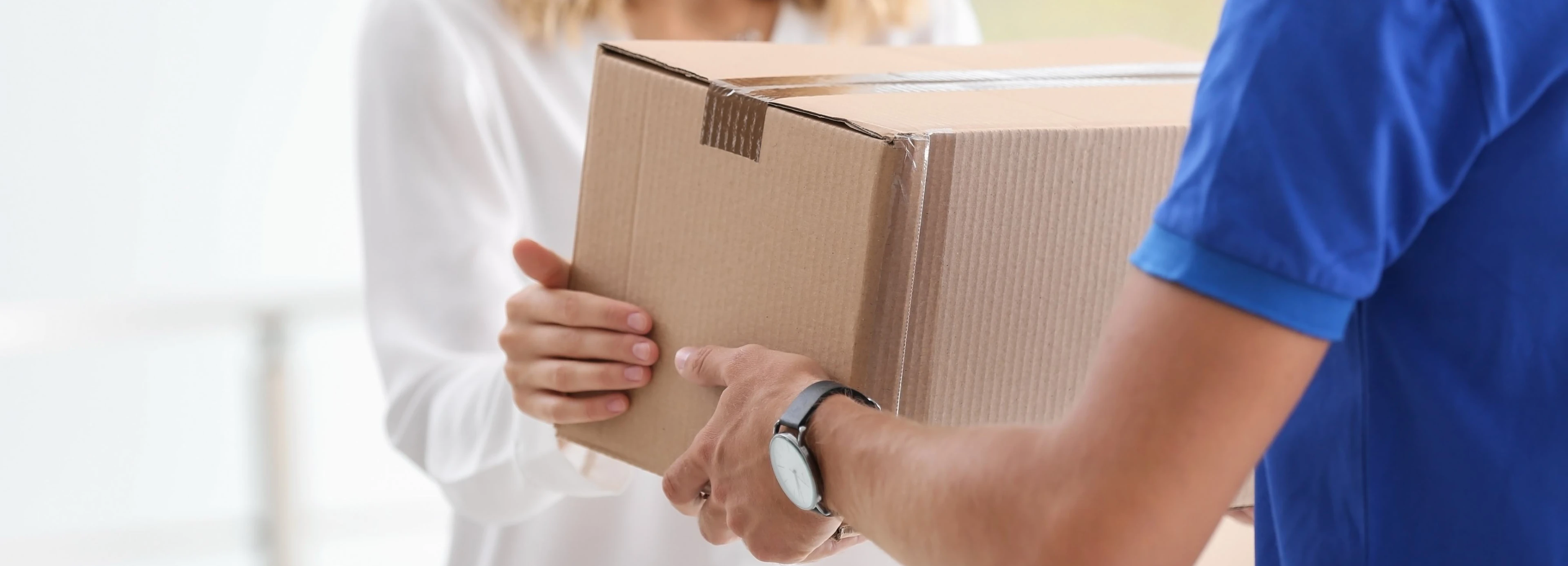 Delivery courier delivering package directly to customer
