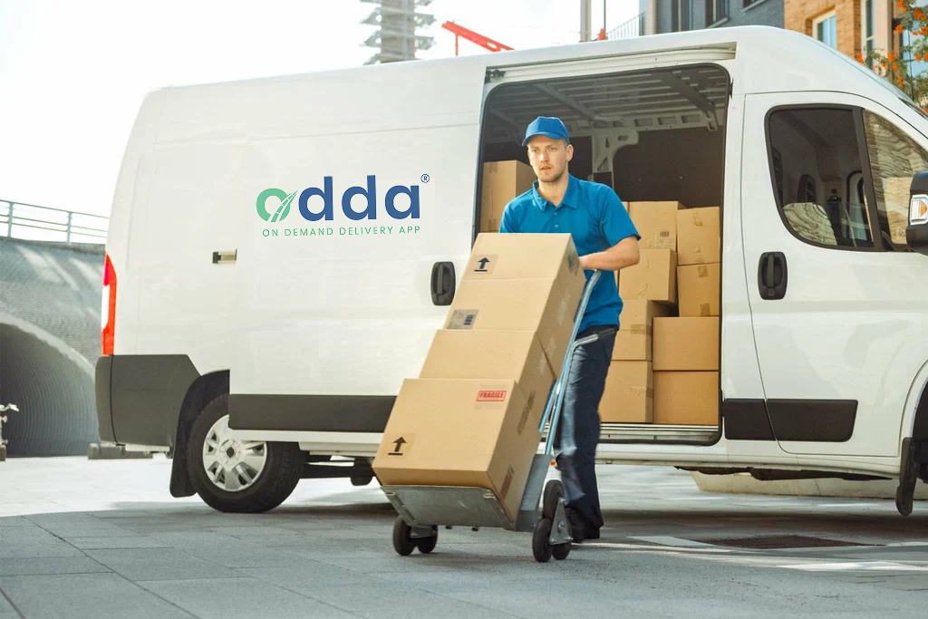 Odda courier unloading parcels from a delivery van